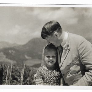 Adolf Hitler with young girl, Rosa Bernile Nienau, on the Obersalzberg.
